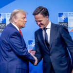 Donald Trump and Mark Rutte shake hands at the Nato summit. Photograph: Robin Utrecht/Shutterstock